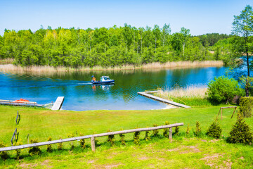 View of camping site on shore of Wigry lake, Wigry National Park, Podlasie, Poland