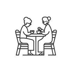 Two Elderly People Sitting at a Table and Eating