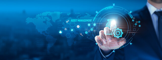 Asset Management Concept: Businessman touching asset management icon on virtual interface, investment, portfolio, diversification, risk assessment, valuation, performance tracking.