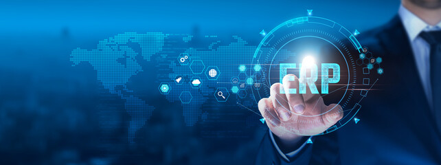 ERP concept: Businessman touching ERP on virtual interface, integration, automation, real-time data, efficiency, scalability, collaboration.