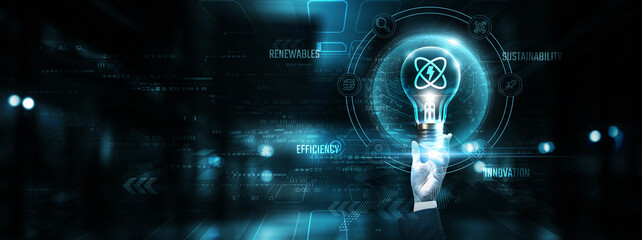 Energy Technology: Hands of businessman holding light bulb and energy technology icon with data network digital technology. Sustainability, efficiency, renewable, innovation.