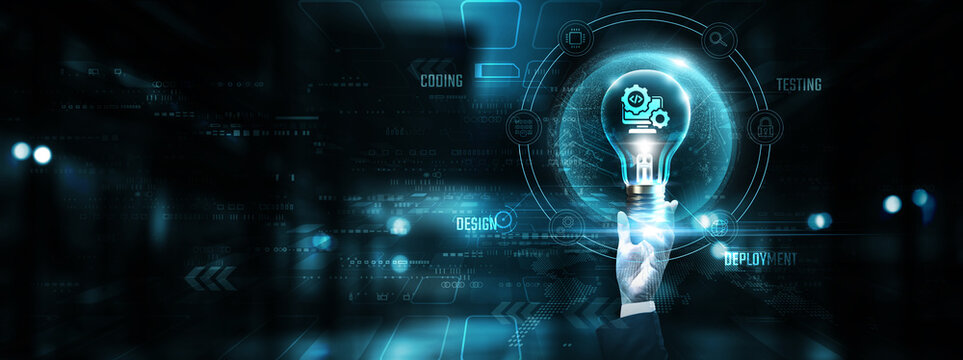 Software Development: Hands of businessman holding light bulb and software development icon with data network digital technology. Agile methodology, coding, collaboration, innovation.