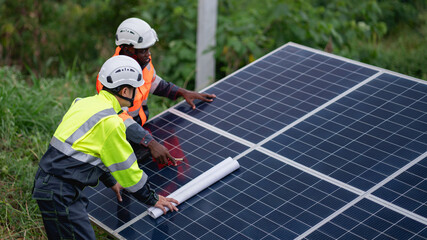 Service engineer inspects and maintains solar panels in a cultivation area, promoting clean energy.