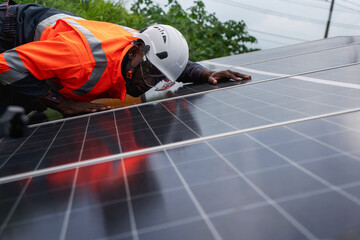 Service engineer inspects and maintains solar panels in a cultivation area, promoting clean energy.