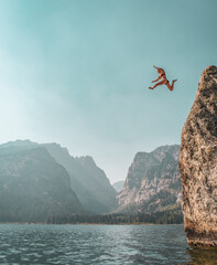 cliff jumping in the mountains