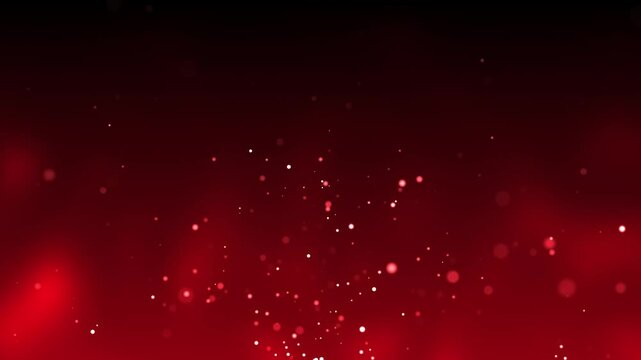 Dark red abstract background with particles and points of light creating a beautiful bokeh.  Seamless loop 4k video.
