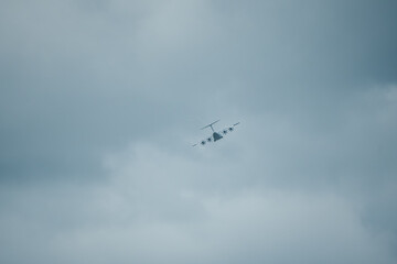 an RAF Airbus A400M military transport cargo aircraft banking in flight