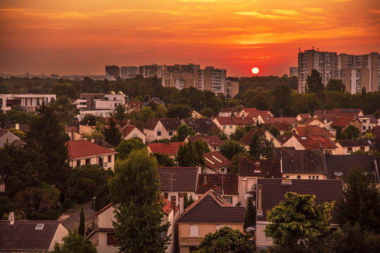 Red sky at sunrise over the town of Massy in the Essonne region of Ile de France