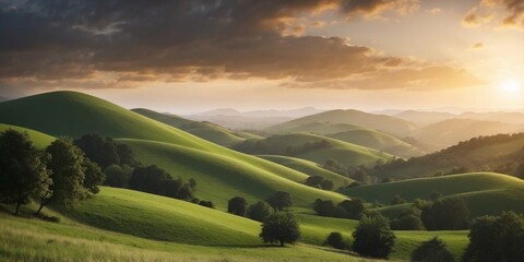 Serene green hills under a dynamic sky at sunrise.