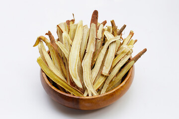 Liquorice sliced on white background.