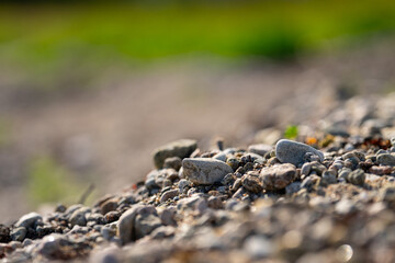 Round brounded rocks on a beach.
