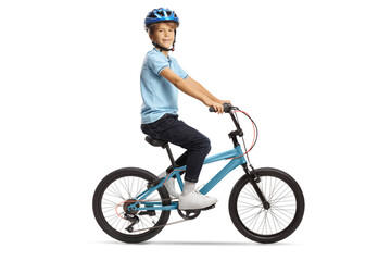 Naklejka premium Happy boy with a bicycle riding a bicycle