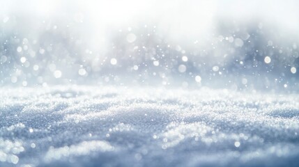 Fototapeta premium Snowflakes gently falling on a serene winter landscape during a bright sunny day