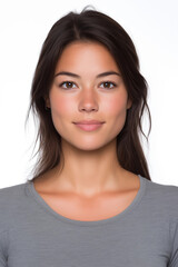 Fototapeta premium Foto für Reisepass - Junge Frau mit langen dunklen Haaren