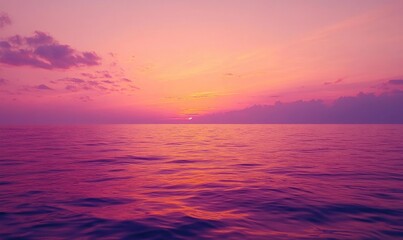 Obraz premium Soft purple and pink sunset, distant horizon blending with the colorful sky