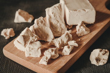 fresh yeast in the kitchen. Bakery food concept 