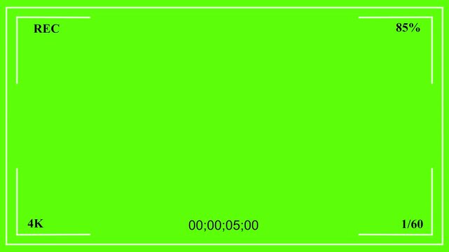 Cinematic camcorder, recorder. viewfinder with green screen, alpha channel. Recording concept with timecode. Plain green screen of camcorder filming with timer, flashing  and battery life