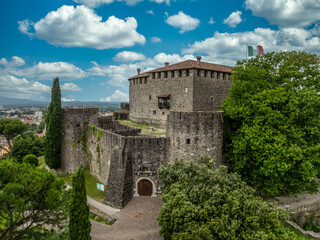 Aerial view of Gorizia castle and town with concentric towers, restored palace on the border...