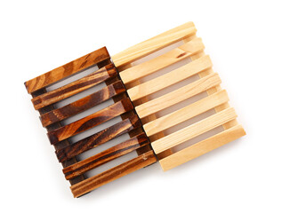 Wooden soap dishes isolated on white background