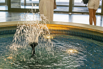 decorative fountain in the lobby of the shopping center