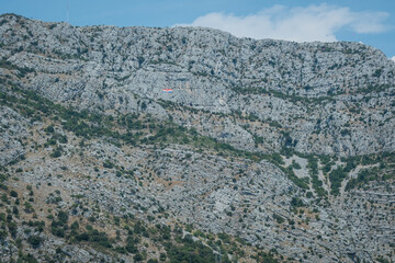 Huge Croatian flag on a mountain in Dubrovnik. National flag of Croatia. 