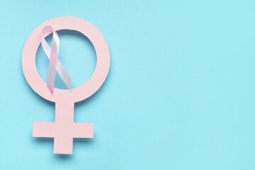 Female gender symbol with awareness pink ribbon on color background. Breast cancer concept