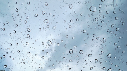 Rain water drops on glass