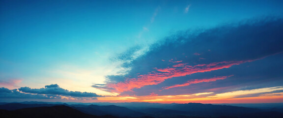 Fototapeta premium Bright Blue-Toned Sky Over a Mountain Landscape