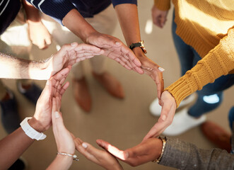 Obraz premium University student, hands and synergy in circle for team building, collaboration and effort. Education, people and above with revision or study group for assignment, project and exams at college