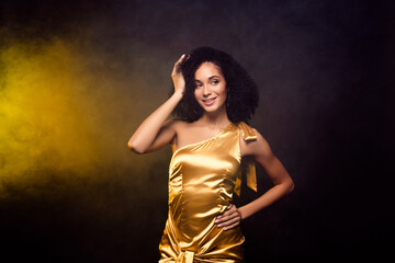 Photo of classy dreamy lady wear gold dress enjoy dance festive isolated black color background