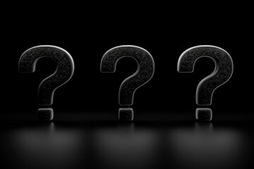Three Question Marks in a Row on a Black Background
