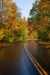 Autumn New England Road Kancamagus Scenic Byway. Colorful Fall Foliage Wet Pavement Beautiful Mountain Road Adventure Roadtrip