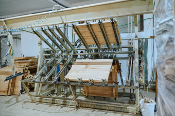 Naklejka premium Interior of Wood Processing Industry Featuring CNC Cutting Machines and Wood Processing Equipment