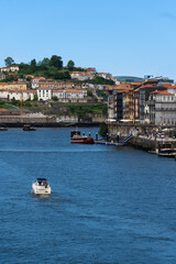 View of Porto city and Douro river and Dom Luis bridge. Porto, Vila Nova de Gaia, Portugal....