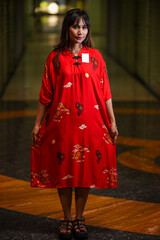 portrait of a woman in the city with beautiful dress