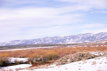 Snow Swept Mountains in the Distance