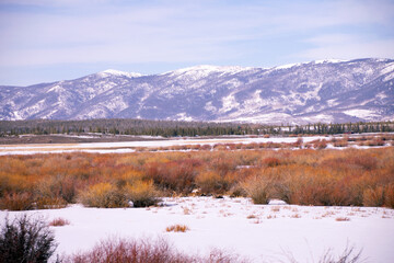 Snow Swept Mountains in the Distance