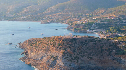 Aerial view of the Sounion temple and cape near Athens Greece towards sunset