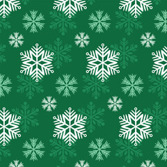Seamless winter background with snowflakes. Snowflakes on a green background.