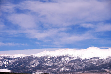Snow Swept Mountains in the Distance