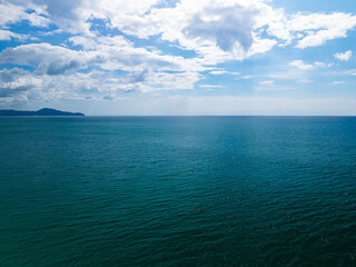 Fototapeta premium Sea surface aerial view,Bird eye view photo of blue waves and water surface texture Blue sea background Beautiful nature Amazing view sea background