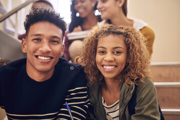 Happy, stairs and portrait of students at university for education, studying or open day. Smile, steps and young friends at college campus for learning, exam or academic scholarship admission test.