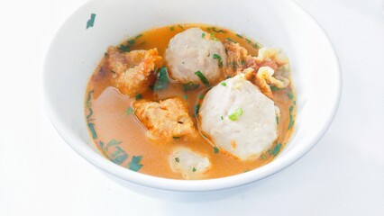 Bakso cuanki (cuanki meatballs) with spicy broth contains meatballs and fried dumplings. Coming from Bandung, Indonesia. It's delicious to eat while it's still hot