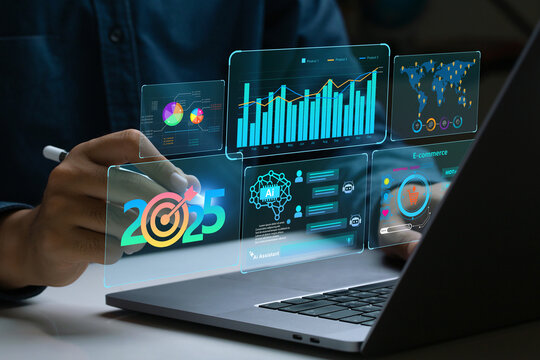 Businessman works on laptop Showing 2025 business trends dashboard with charts, metrics, AI, E-commerce, KPI. businessman planning business growth 2025. 2025 annual business plan and business strategy