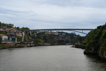 View of Porto city and Douro river and Dom Luis bridge. Porto, Vila Nova de Gaia, Portugal....