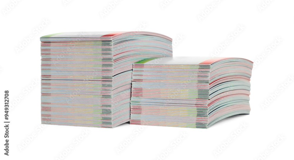 Poster Stacks of business cards on table against white background