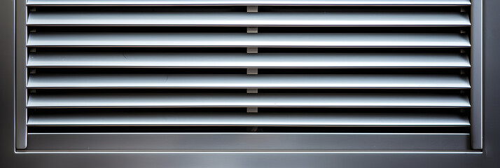 Obraz premium Close-up Detailed View of a Modern, Metallic HVAC Vent Installed in Wall