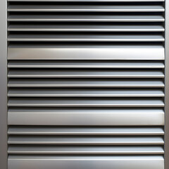 Close-up Detailed View of a Modern, Metallic HVAC Vent Installed in Wall