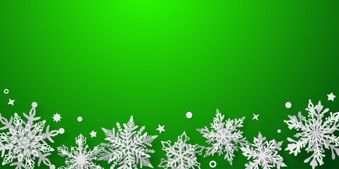 Christmas illustration with beautiful white complex snowflakes with soft shadows on green background