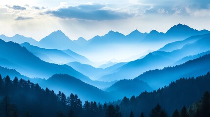 Obraz premium Majestic mountain peak shrouded in fog and clouds, creating a dramatic and serene landscape.